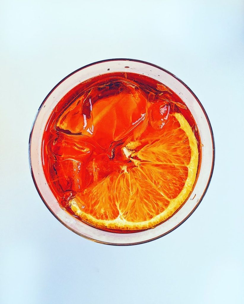 a drink with a slice of orange