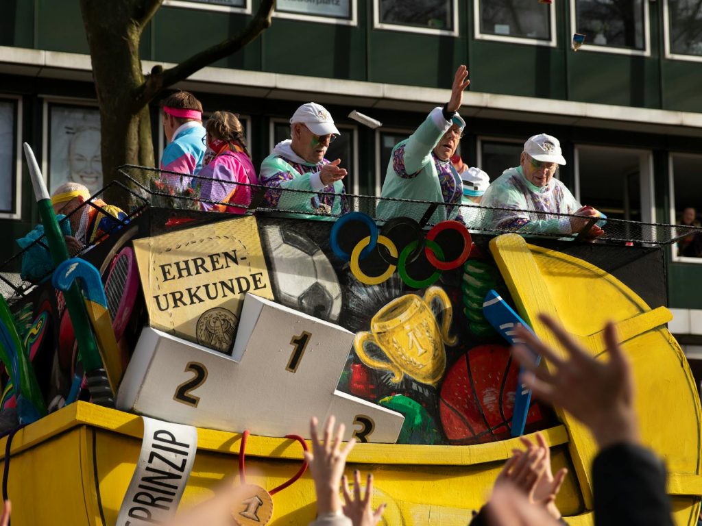 Colorful carnival float during Cologne's famous street parade, capturing lively celebrations.