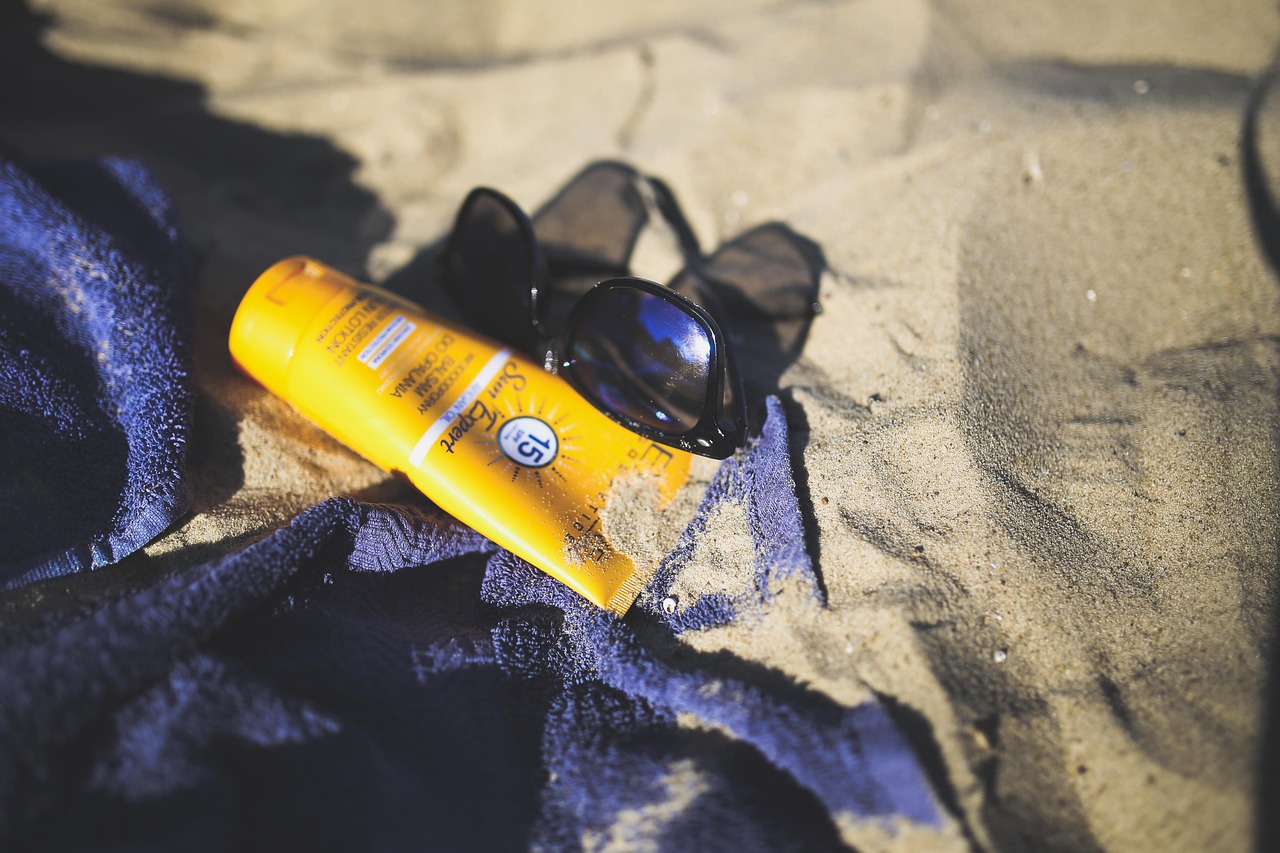sun, sunblock, sun block, balm, creme, nature, beach, summer, vacation, holiday, sand, sunglasses, towel, brown sun